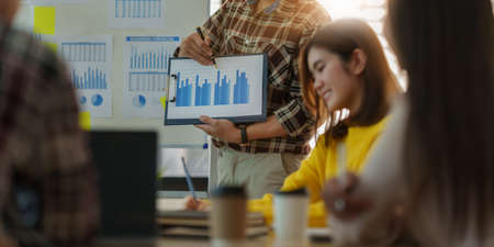 Multiracial corporate business team discuss and consult to offer new idea at exclusive meeting room. finance concept.の写真素材