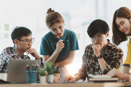 Group of Success Business people at meeting room. Young Asian team making project start up concept.の写真素材