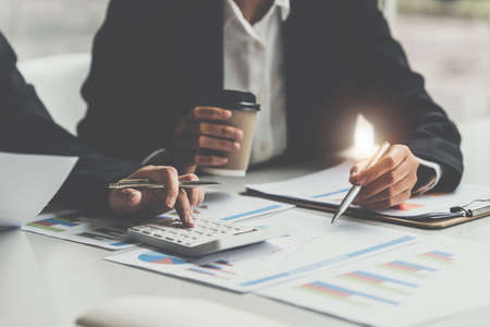 Fund managers team consultation and discuss about analysis Investment stock market. Business Financial concept.の写真素材