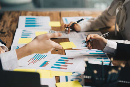 Group of Businesswoman and Accountant checking data document on digital tablet for investigation of corruption account. Anti Bribery concept.の写真素材