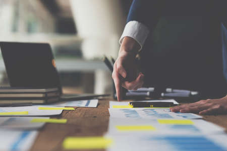 Fund managers team consultation and discuss about analysis Investment stock market by financial paperwork.の写真素材