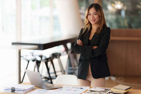 Modern Asian Business woman have confident working with financial at office. Accounting concept.の写真素材