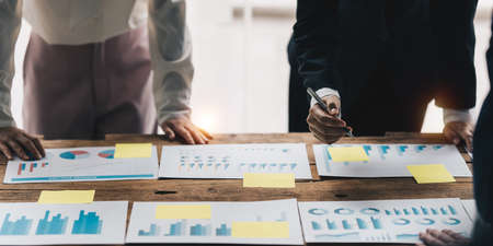 Business team hands at working with financial plan, meeting, discussion, brainstrom with tablet on office desk, Meeting concept.の写真素材