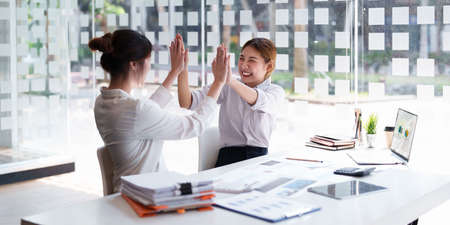 Successful business and partner achieving goals. Account and Finance concept.