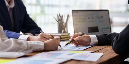 Business team brainstorming analyze financial at office. Business Corporate Management Planning Team...