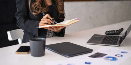 Asian Business consultant working together and management big data and analyze financial budget of company. Fund investment concept.の写真素材