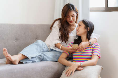 Young Asian Women LGBT lesbian couple love moments happiness at bedroom. LGBTQ or Gay and pride concpet.の写真素材