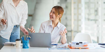 Group of IT consultant working by digital tablet and management big data and analyze financial document of company.の写真素材