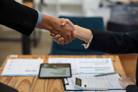 Business partnership meeting concept. Image business woman handshake. Successful business people...