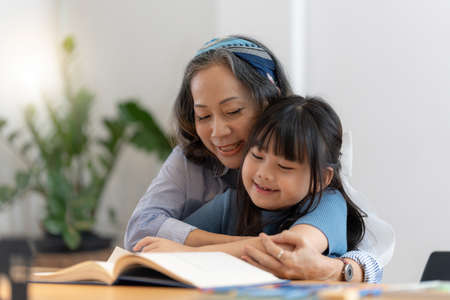 Happy moment of Daughter enjoying time together with mother at home. little child girl having fun.