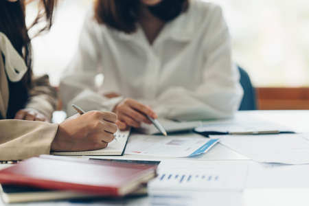 Fund managers team consultation and discuss about analysis Investment stock market