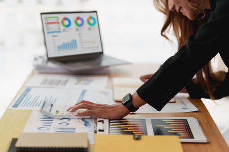 Business Finance audit tax Concept. Portrait of Young business women analytics about marketing plan...