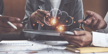 Administration or Accountant discussing with partner are meeting to audit finance planning sales to meet targets set in next year. Finance concept.の写真素材