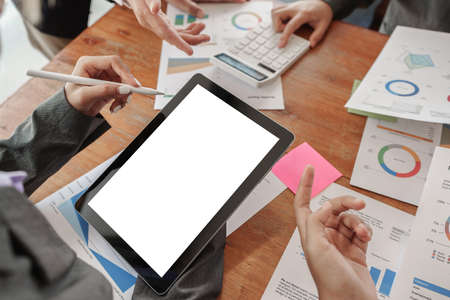 Analytics intelligence concept. Group of business people discuss current financial and economic on...