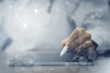 Doctor using digital tablet virtual screen. Modern medical banner background conceptの写真素材