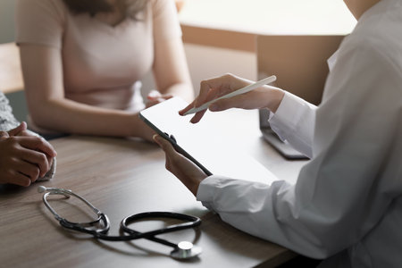 Doctor explain to patient about health care. Medicine and health care and insurance conceptの写真素材