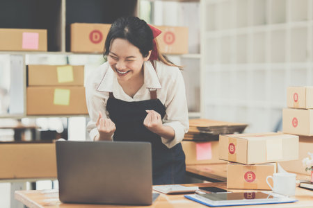 Asian small business owner working at home office. Business retail market and online sell marketing...