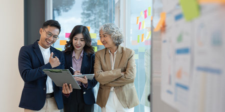 Group of Business people discuss a marketing strategy to improve the quality of their sales in the future at meeting roomの写真素材