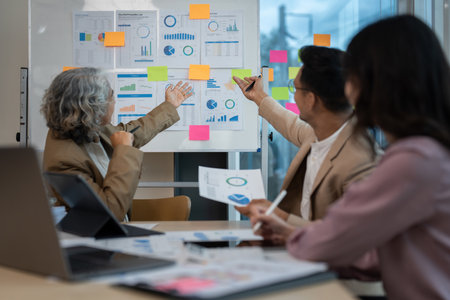 Group of Business people discuss a marketing strategy to improve the quality of their sales in the future at meeting roomの写真素材