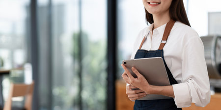 Successful small business owner sme beauty girl stand at her cafe