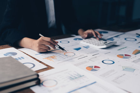 Asian Business woman making business call talking on phone. Account and Finance conceptの写真素材