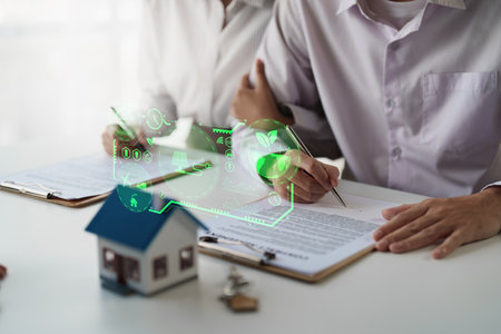 Real Estate Agent explain insurance and agreement contract to client before sign contract.の写真素材