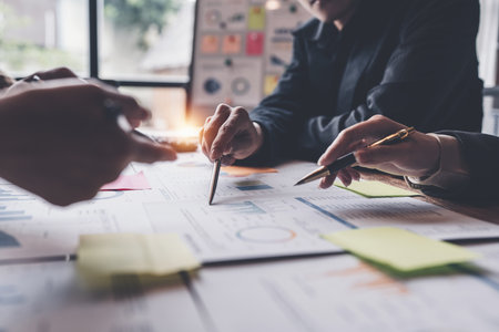 Group of IT consultant working management big data and analyze financial document of companyの写真素材