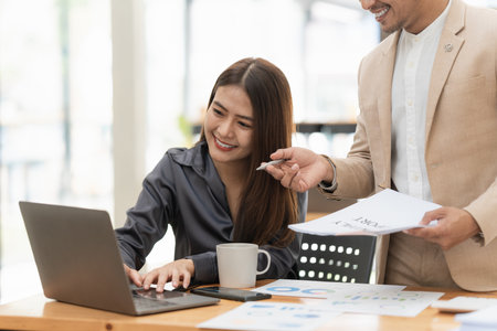 Business team hands at working with financial plan, meeting, discussion, brainstorm with tablet on office desk, Meeting conceptの写真素材