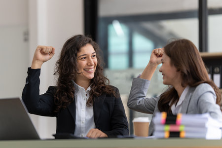 Smiling Businesswoman working with partner at office. finance concept.の写真素材