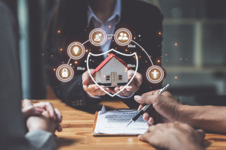 Real Estate Agent explain insurance and agreement contract to client before sign contractの写真素材
