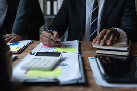 Group of Businesswoman and Accountant checking data document for investigation of corruption account. Anti Bribery conceptの写真素材