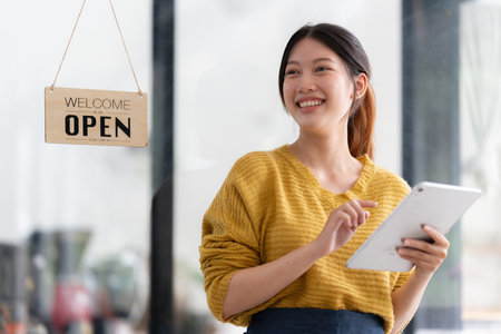 Portrait of Startup successful small business owner in coffee shop. SME entrepreneur seller business conceptの写真素材