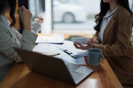 Group of business consultant working management big data and analyze financial document of company....