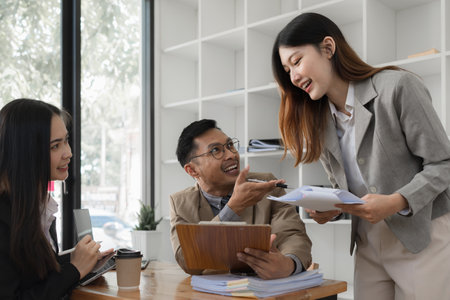 Group of business consultant working management big data and analyze financial document of companyの写真素材