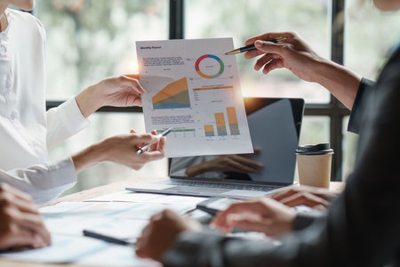 Group of Business people meeting for analysis data figures to plan business strategies. Business discussing, finance conceptの写真素材