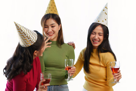 Friends at birthday party clinking glasses with champagne and pizza, enjoying christmas vacation, pizza on the table. Holiday Party eventの写真素材