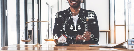 Lawyer working at office. Asian Lawyer doing with contract or document in office. Law, legal services, advice, Justice and real estate conceptの写真素材