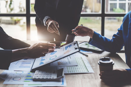 Business financial team with finance reports to analyze big data, balance sheet, accountの写真素材