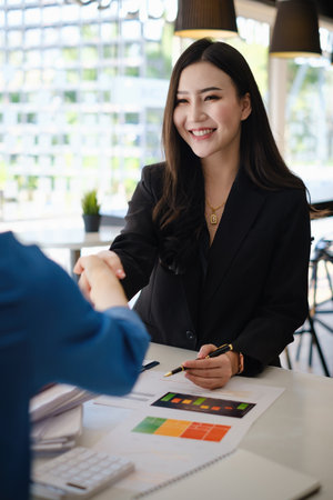 Business people successful negotiation and handshake. celebration partnership and teamwork, business deal concept.の写真素材