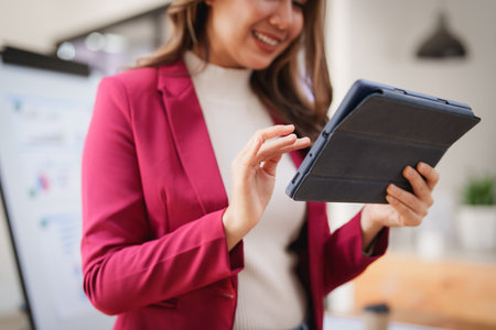 Asian Businesswoman doing strategy of business financial. investment, finance analysis conceptの写真素材