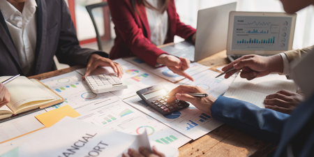 Business team working with financial document at office. analysis, discussion and brainstorming, business strategyの写真素材