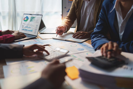 Business team working with financial document at office. analysis, discussion and brainstorming, business strategyの写真素材