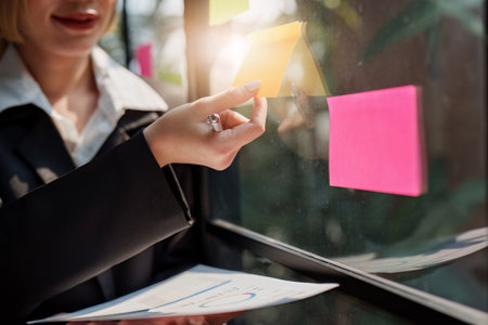 Business people use sticky note for idea analysis and research market goal to successの写真素材