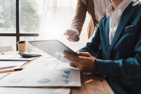 Group of Businessman or Accountant checking finance data document for investigation of corruption account. Anti Bribery conceptの写真素材