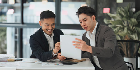 Group of Businessman or Accountant checking finance data document for investigation of corruption account. Anti Bribery conceptの写真素材