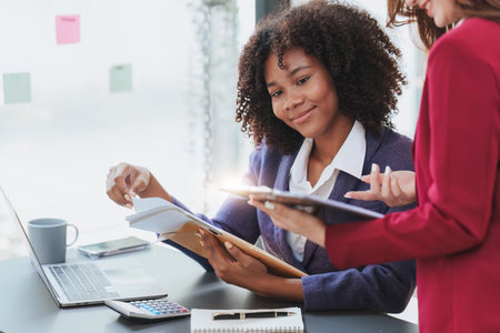 Multiethnic business people in meeting. Accountant people do document, tax, exchange, accounting and Financial advisor conceptの写真素材