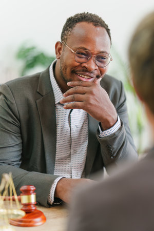 American African Lawyers advice to client about agreement contract. Law, legal services, advice, Justice conceptの写真素材