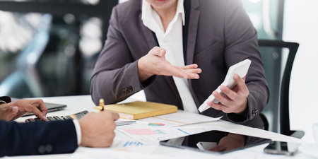 Group of Businessman or Accountant checking finance data document for investigation of corruption account. Anti Bribery conceptの写真素材