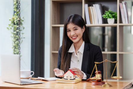 Close up Business people or Real Estate agent explain signing agreement for sale house to client. Property, Insurance, Broker conceptの写真素材