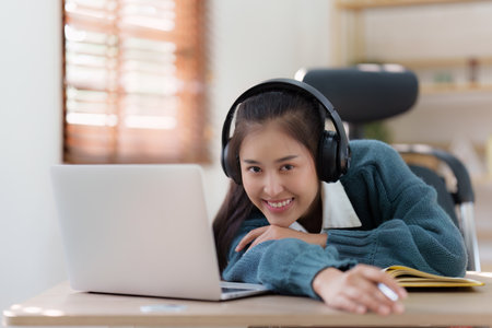 E-learning ,online ,education and internet social distancing. Asian woman student video conference...